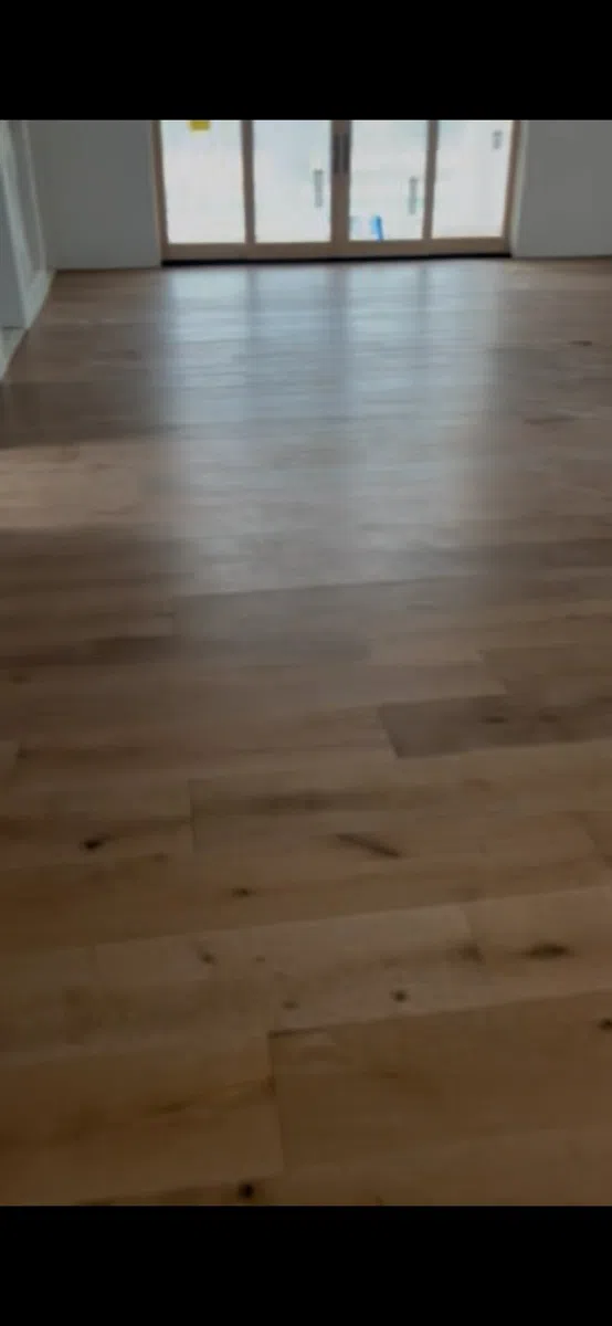 Wide plank wood flooring in residential interior